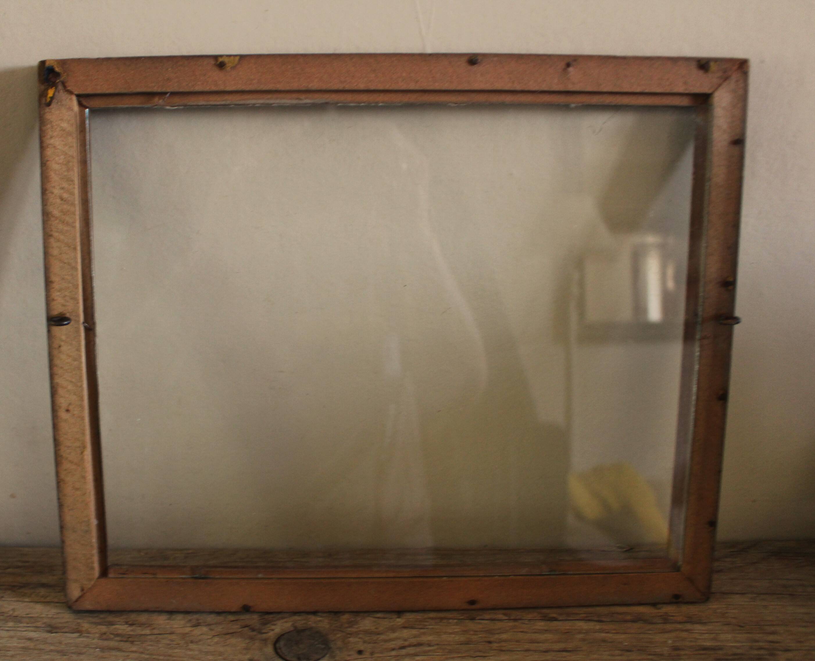 Wood frame old window small flowers framing