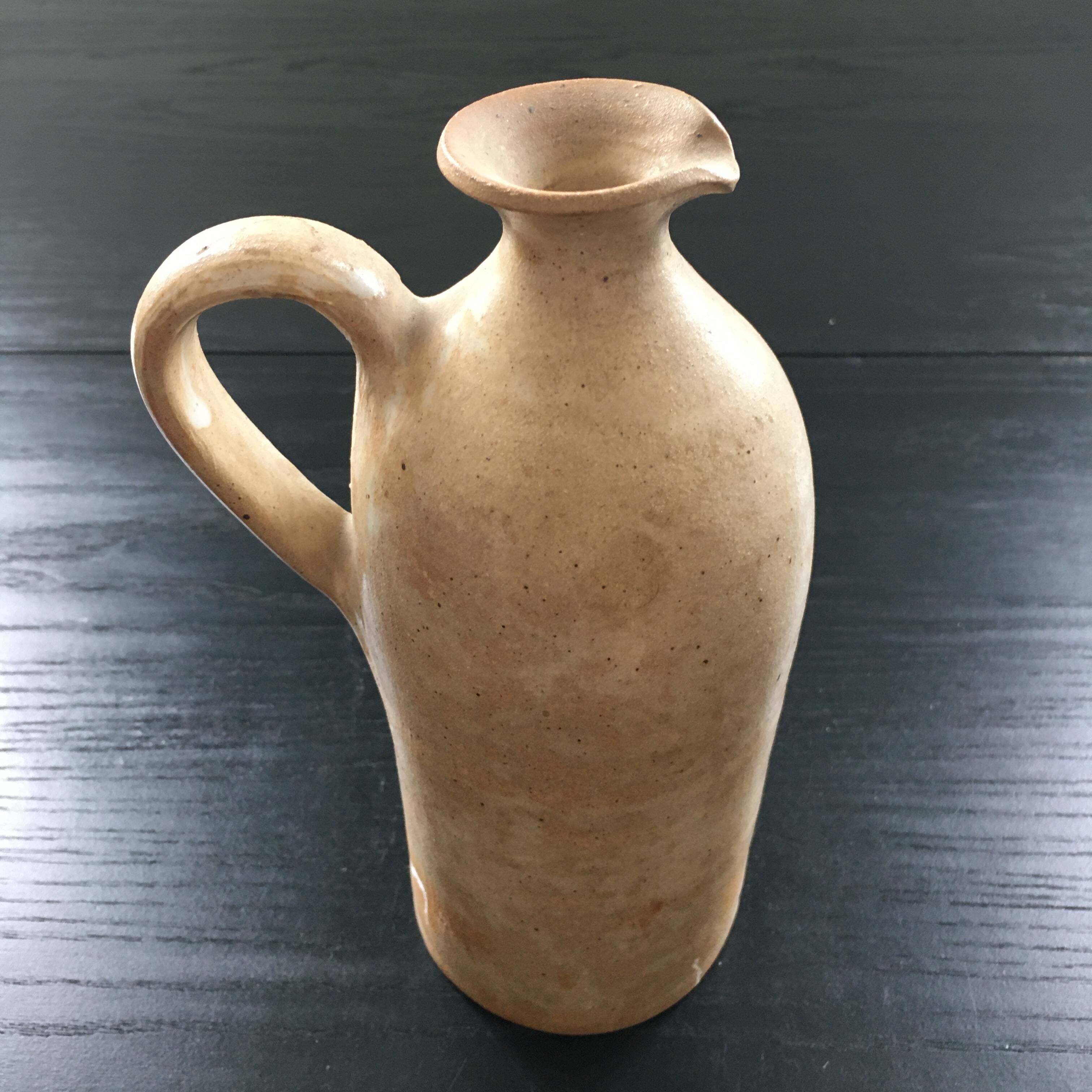 Beige stoneware bottle
