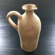 Beige stoneware bottle