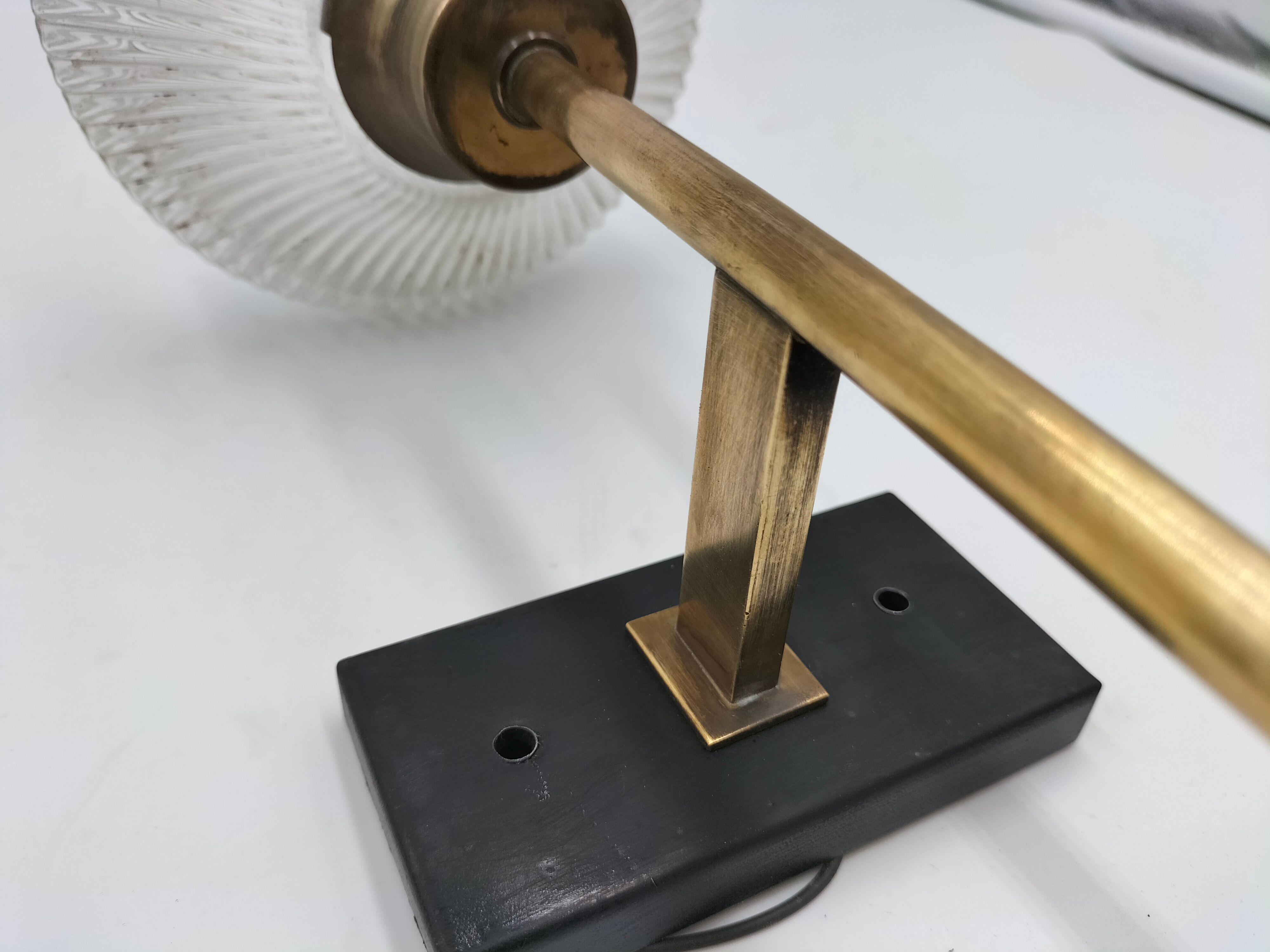 Pair of brass and glass wall lamps