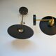Pair of metal wall lamps in black and bronze color