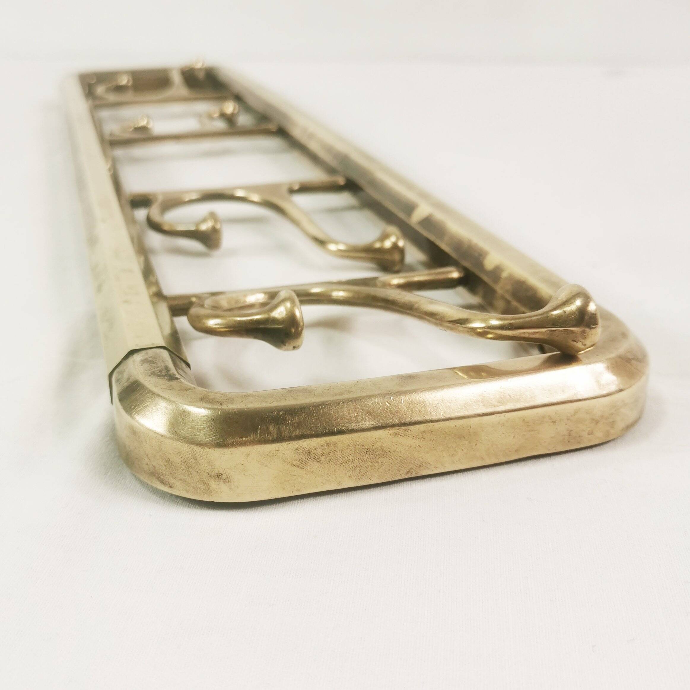 Art Deco brass wall hanger, Austria, 1940s.