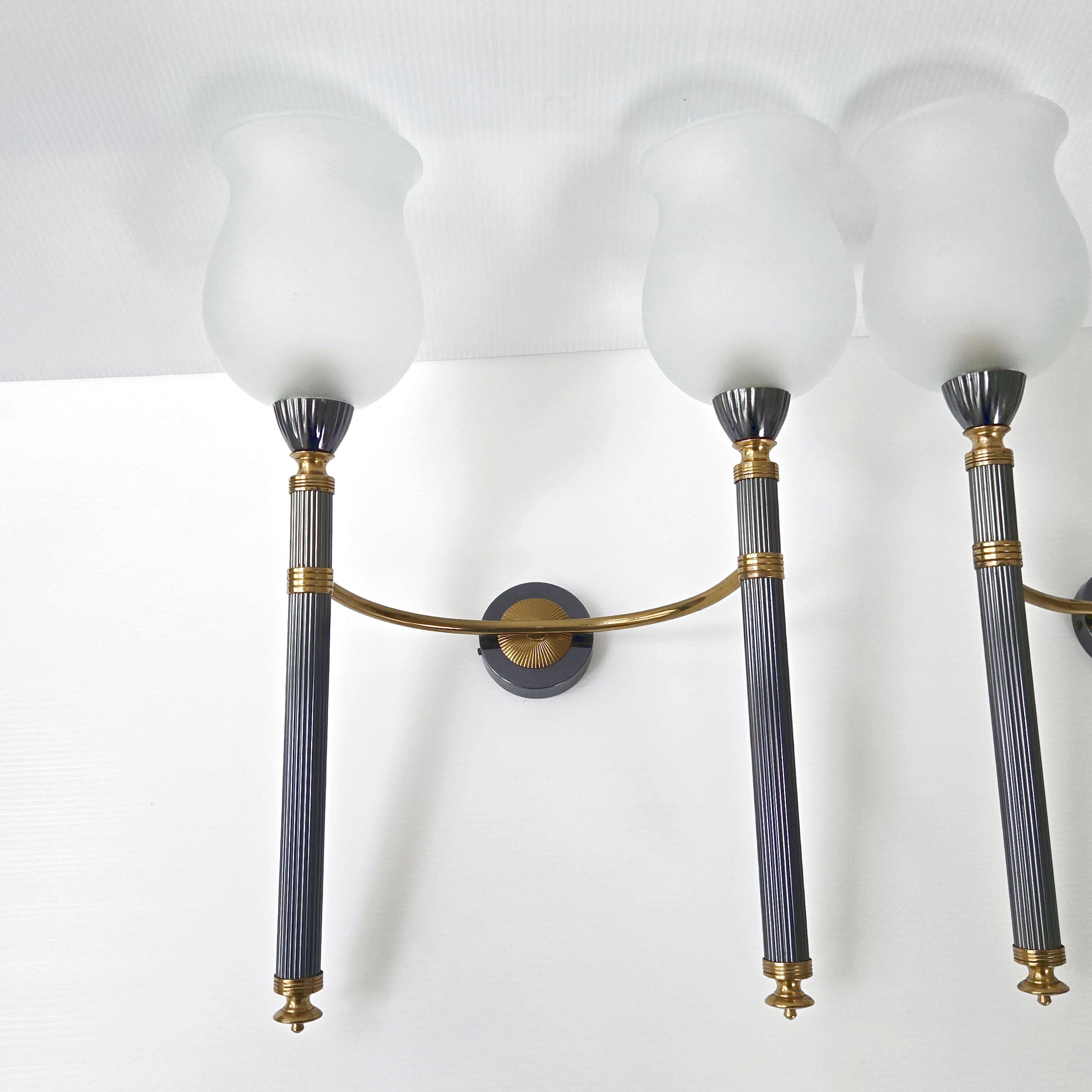 Pair of vintage 1950s torch wall lights