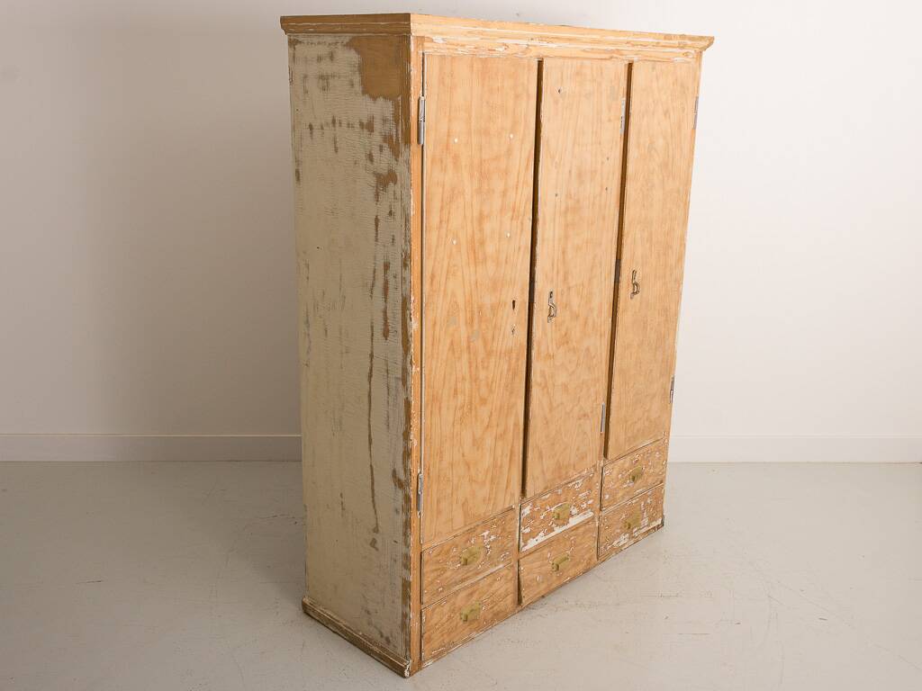 Solid pine cabinet fully stripped consisting of 3 doors and 6 drawers