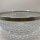 Chiseled glass (crystal?) salad bowl with silver metal edge