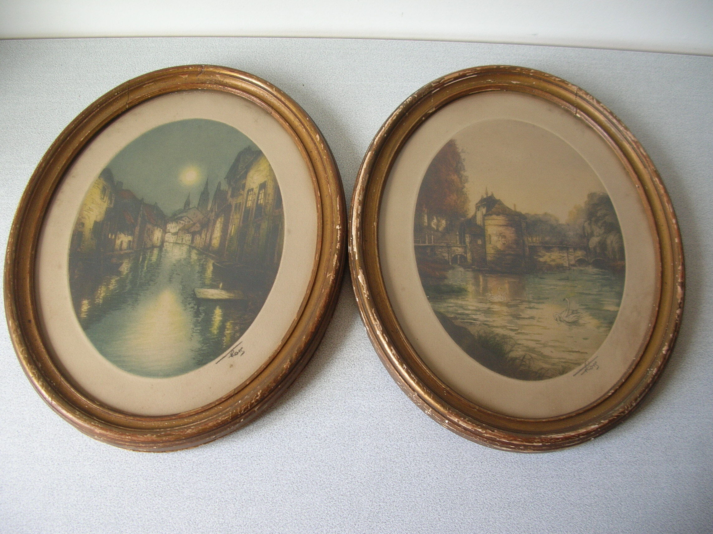 Old pair of lithographs house at the edge of the water signed wooden medallion frame
