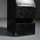 Abstract sculpture in diabase by Robert Neuhauser, Switzerland, circa 1985.