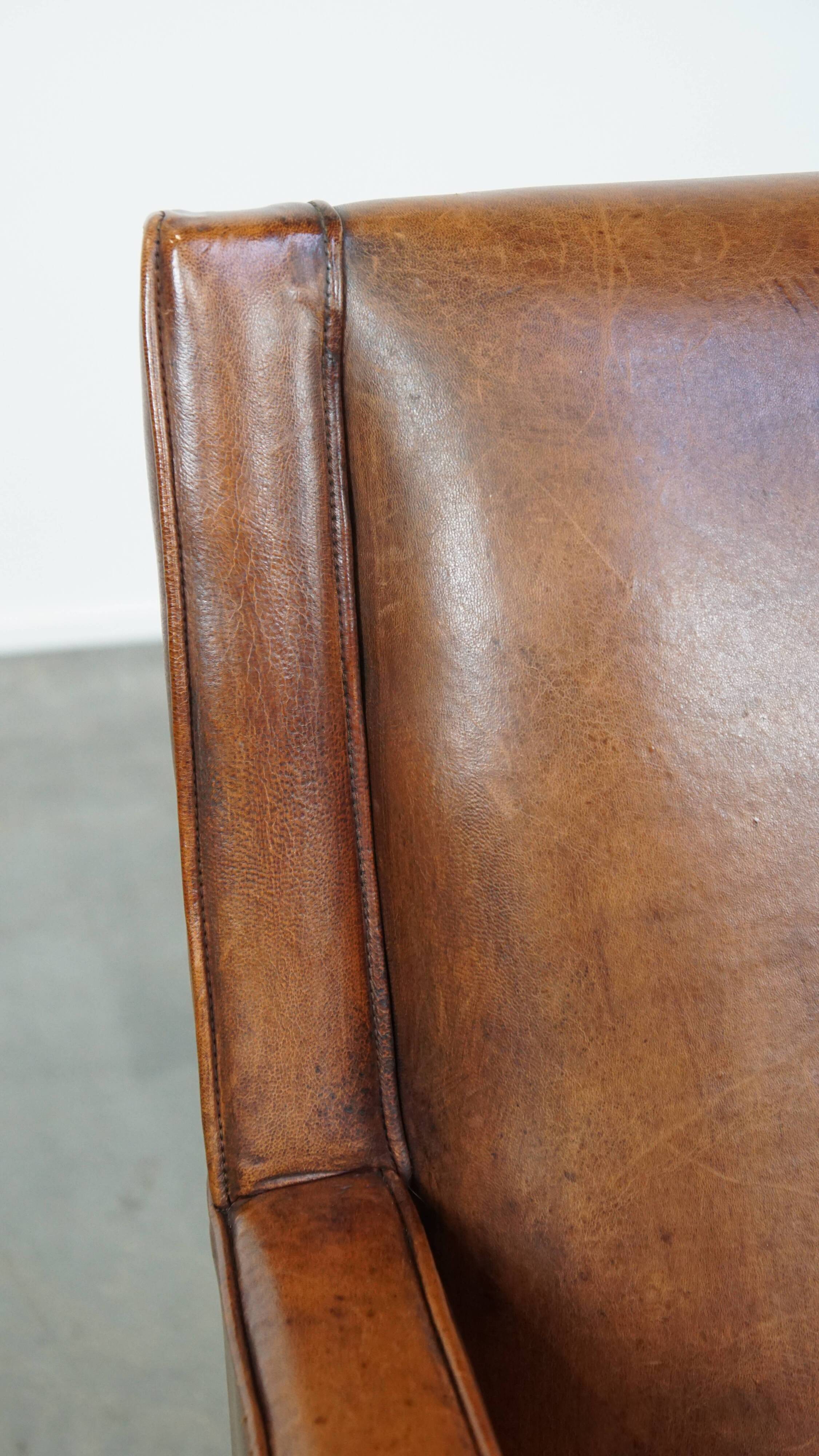 Sheepskin armchair with a refined Art Deco design