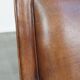 Sheepskin armchair with a refined Art Deco design