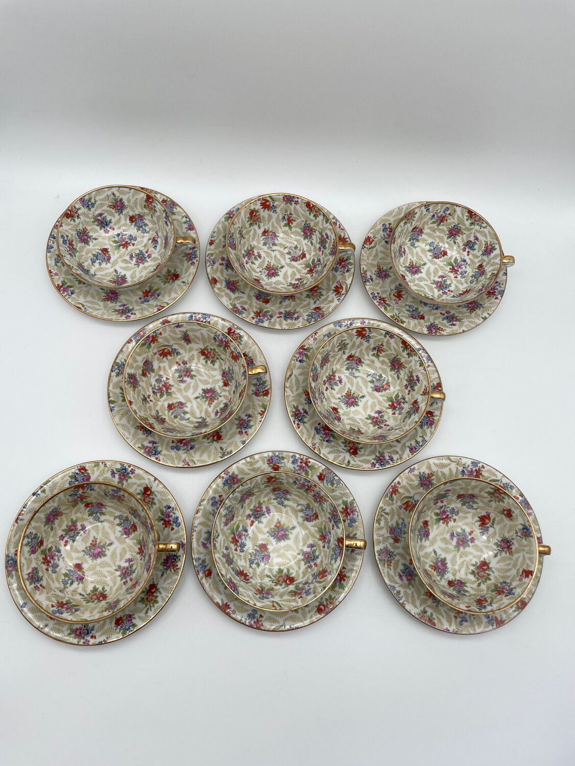 Set of 8 Limoges porcelain coffee cups from France with floral and gold pattern