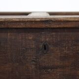 Rustic and weathered antique oak chest from the 18th century.