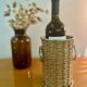 Range bottle in rattan and vintage metal