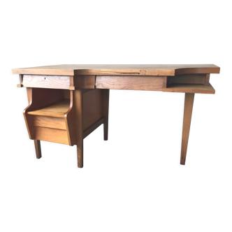 Important double-sided desk in solid oak, circa 1950.