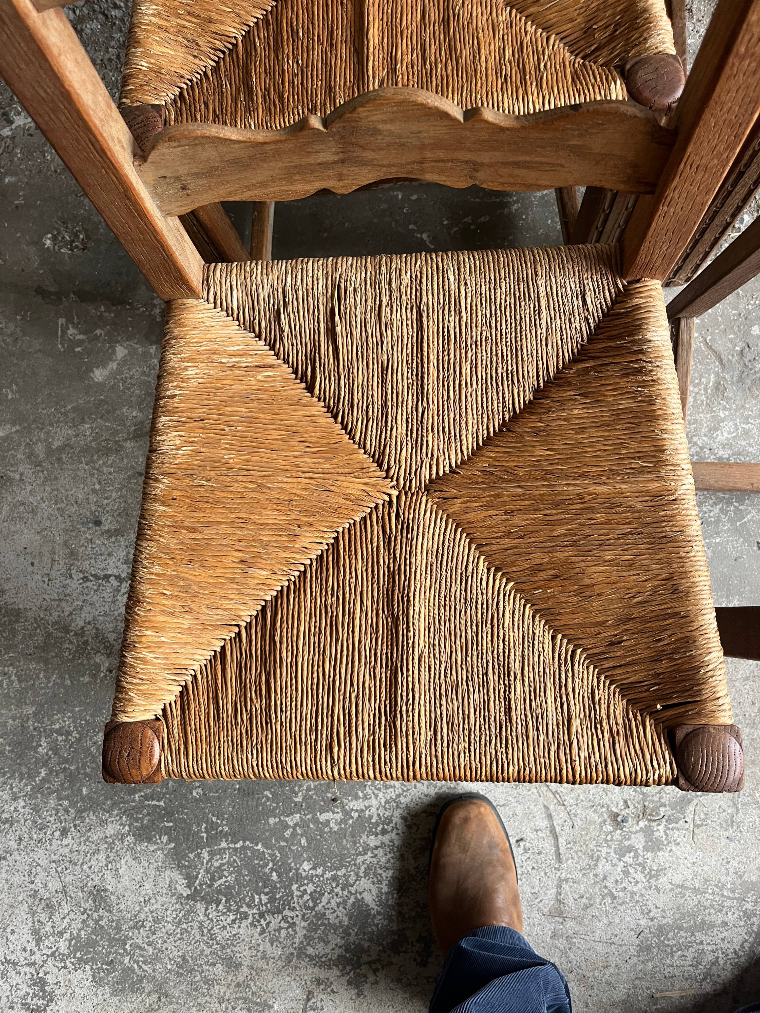 Set of 6 sculpted oak chairs with straw seats – 1950s