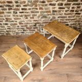 Renovated antique tables in a chic country style – trio of nesting tables