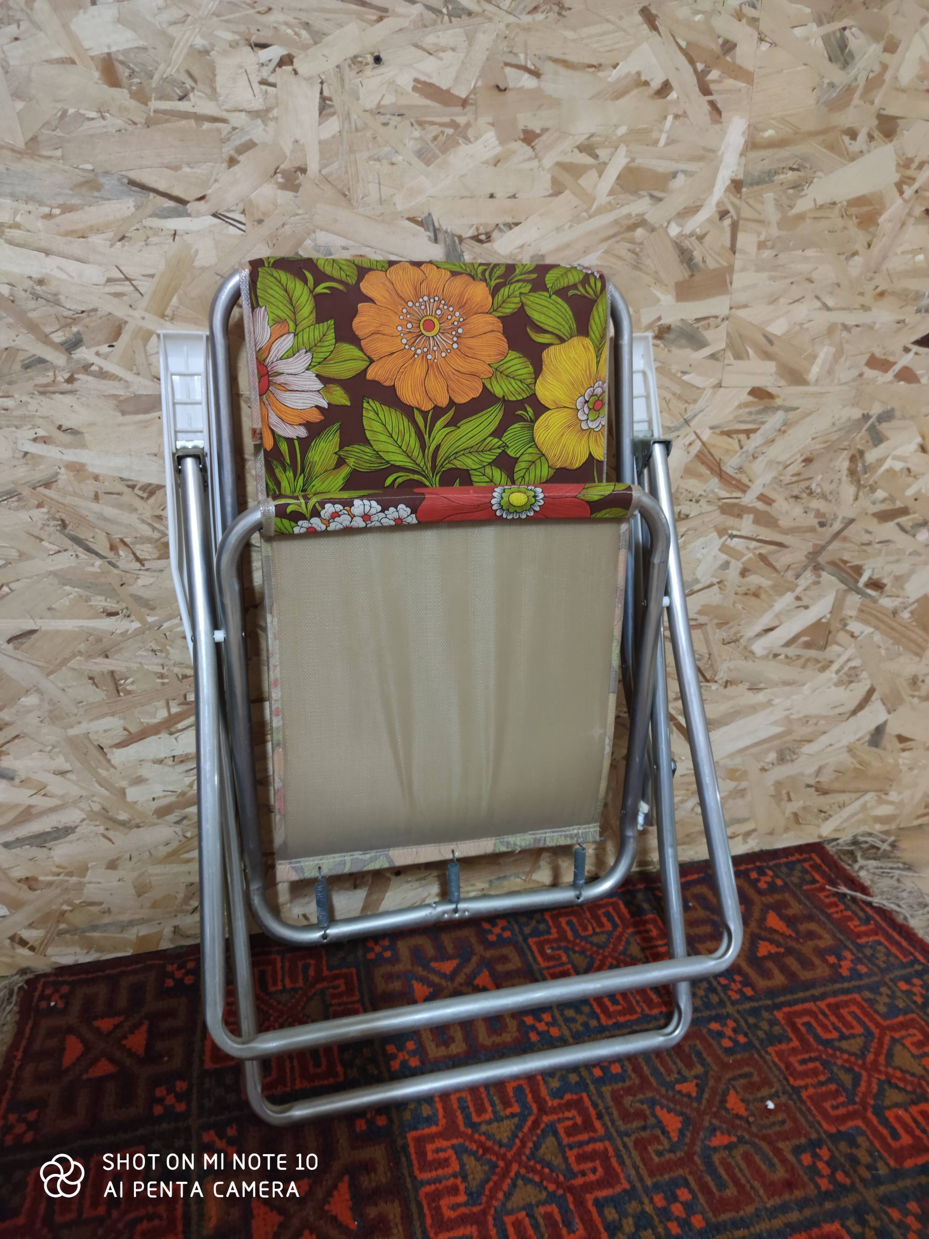 Fauteuil pliant vintage fleuri