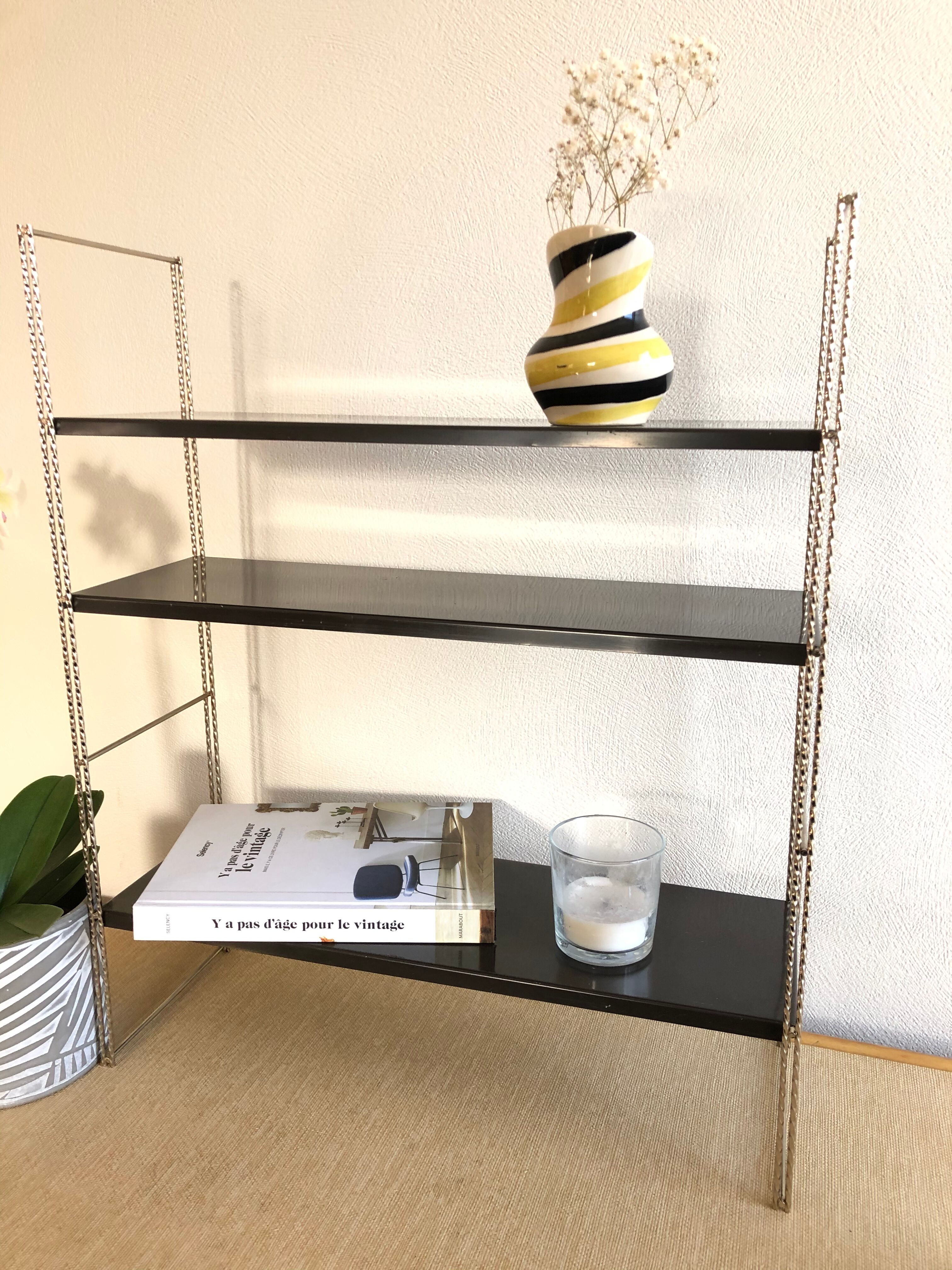 String shelf creation mofp gold and black
