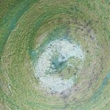 Wabi-Sabi handcrafted ceramic bowl in celadon green, 20th-19th century.