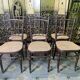 Suite de 6 chaises bistrot en cannage Fischel