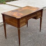 Louis XVI desk in solid wood and leather from the 20th century.