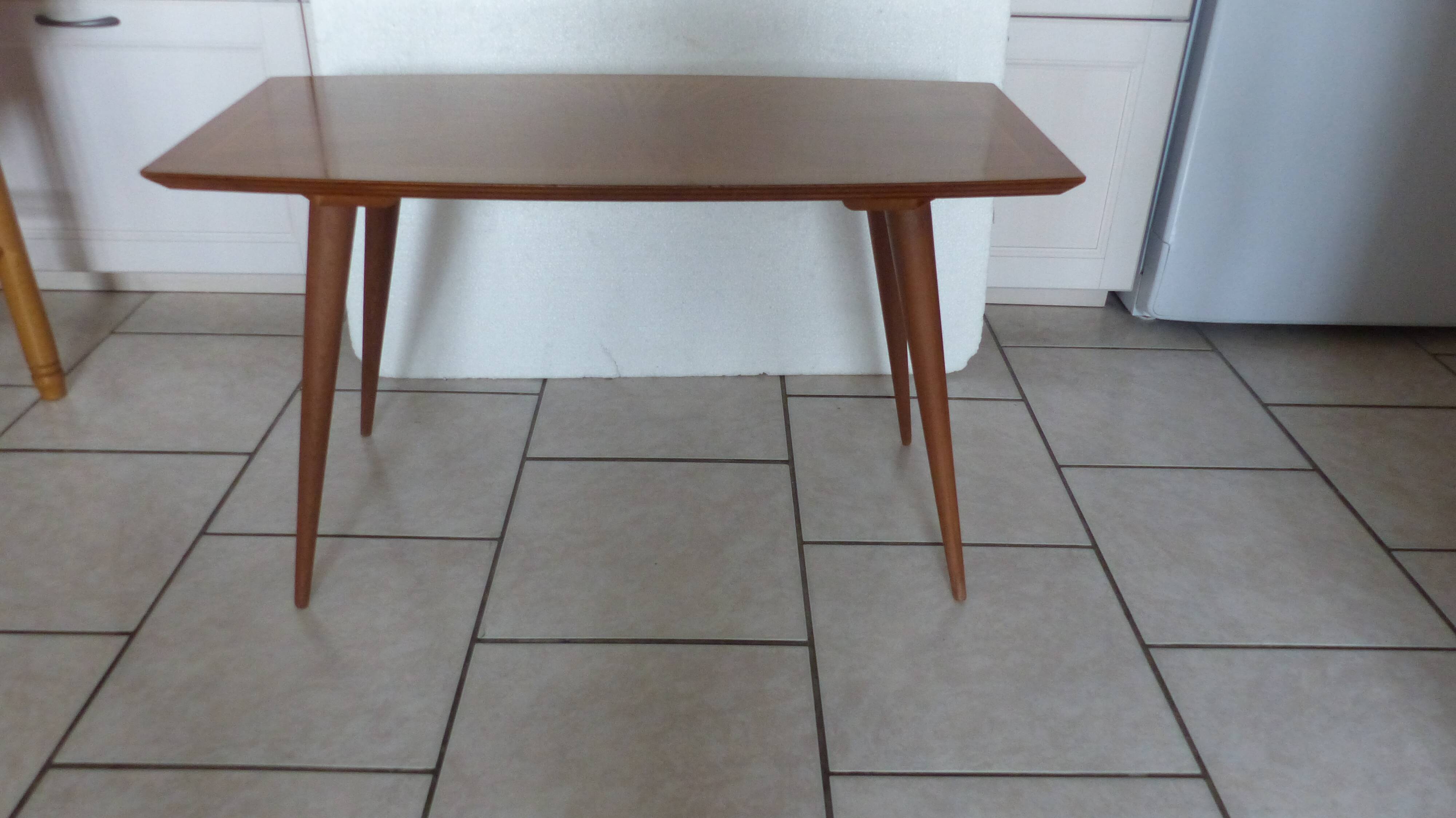 Coffee table with compass legs