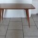 Coffee table with compass legs