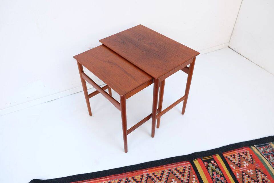 Mid-century side tables and nesting tables, in Wegner Tuck teak, Danish style.