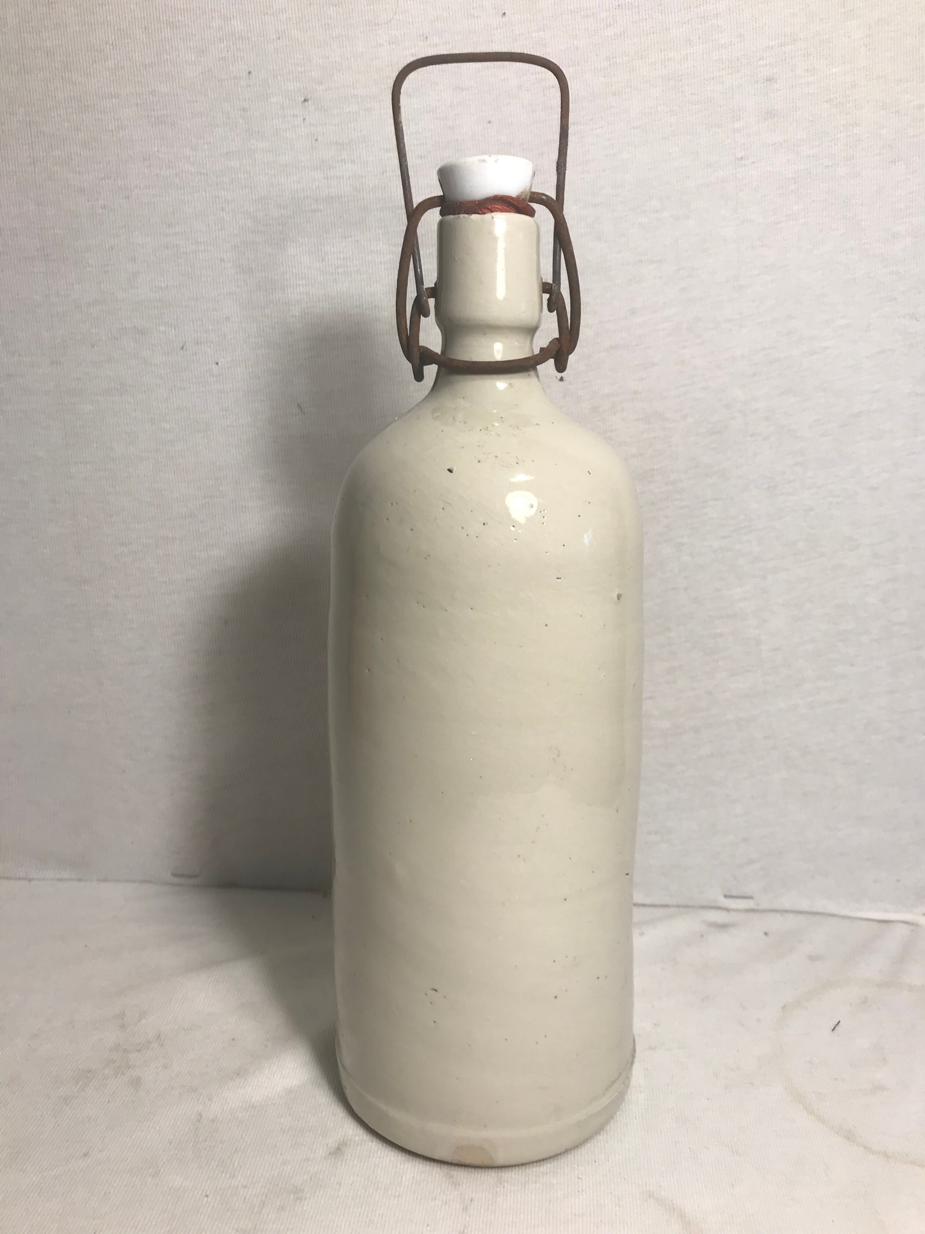 Old bottle enamelled sandstone