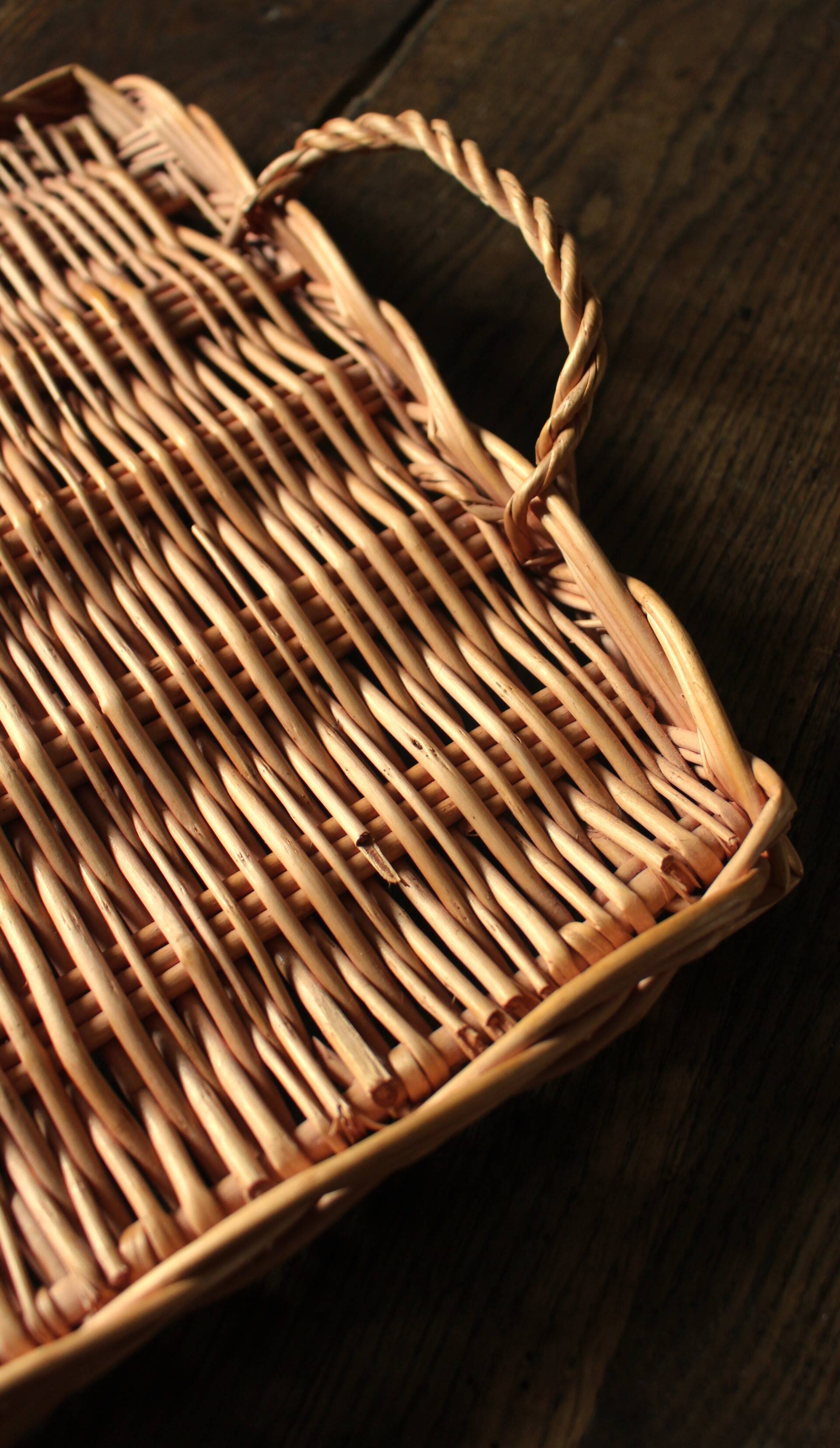 Large rectangular dark wicker tray with two vintage handles