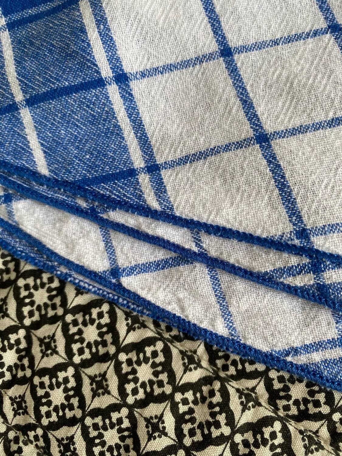 Round cotton tablecloth. Blue and white colors.