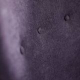 High-backed wing chair in oak and purple fabric, vintage Scandinavian style from the 1950s.