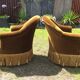 Paire de fauteuils crapauds vintage en velours vert.