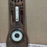 Old barometer and thermometer from the 1930s in carved wood. Signed on the back EH PARIS.