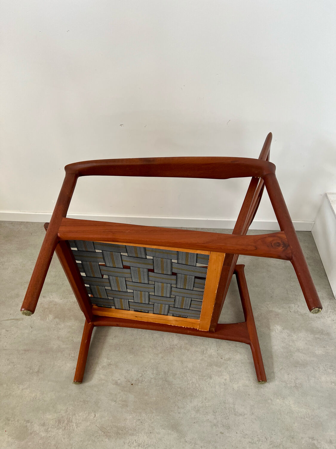 Old Scandinavian design armchair in vintage teak year 60