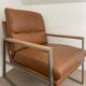A pair genuine leather armchairs.