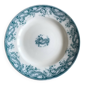 Plat à gâteau ancien sur piédouche en faïence de Sarreguemines
