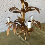 Golden vintage chandelier with leaf decoration