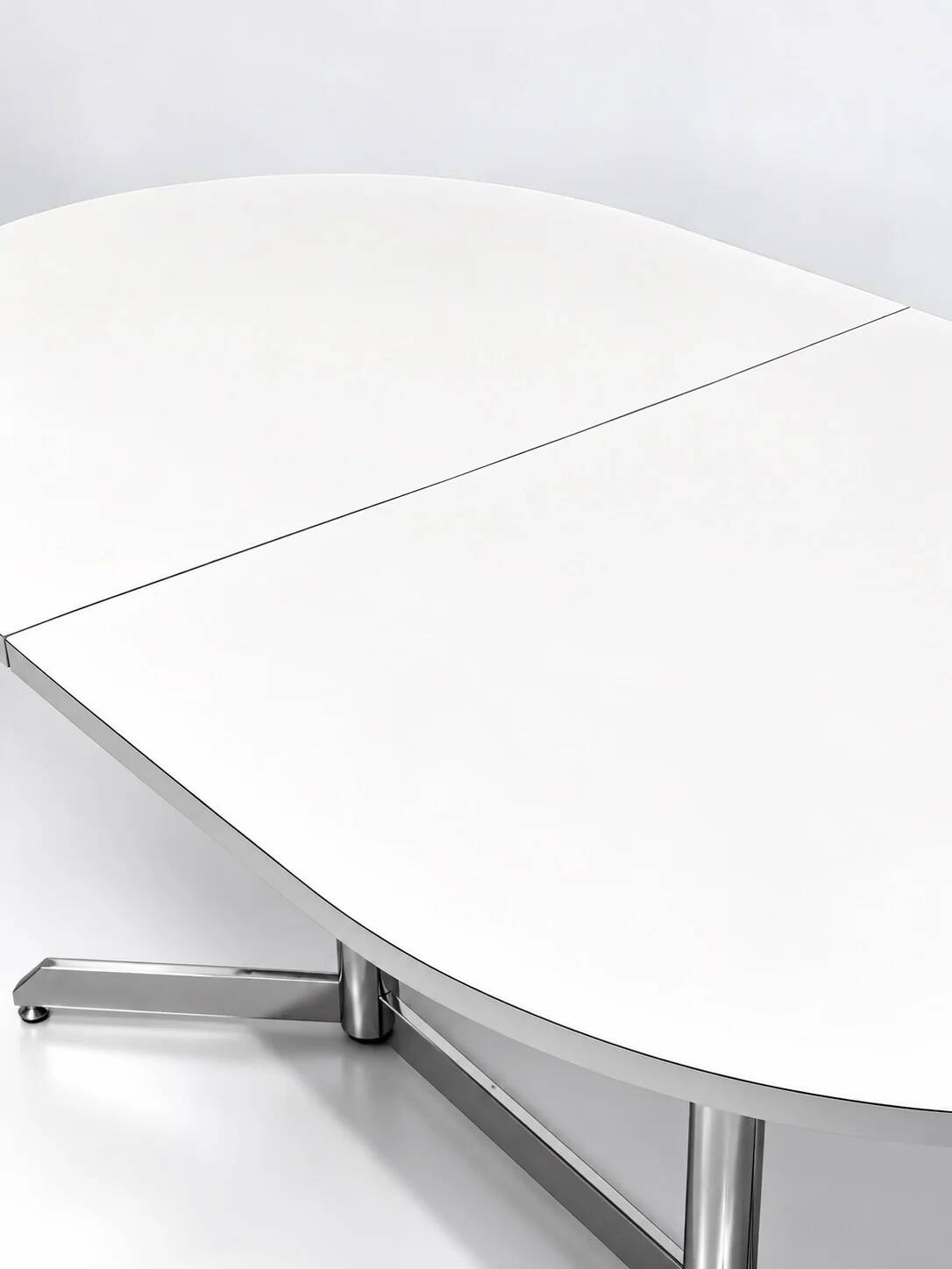 Vintage oval extendable dining table, white laminate and chrome, 1970s.