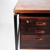 Desk in rosewood and legs in metal, of Danish design from the 1960s