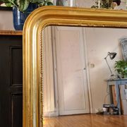 Old Louis Phillipe mercury mirror in gilded stucco with leaf