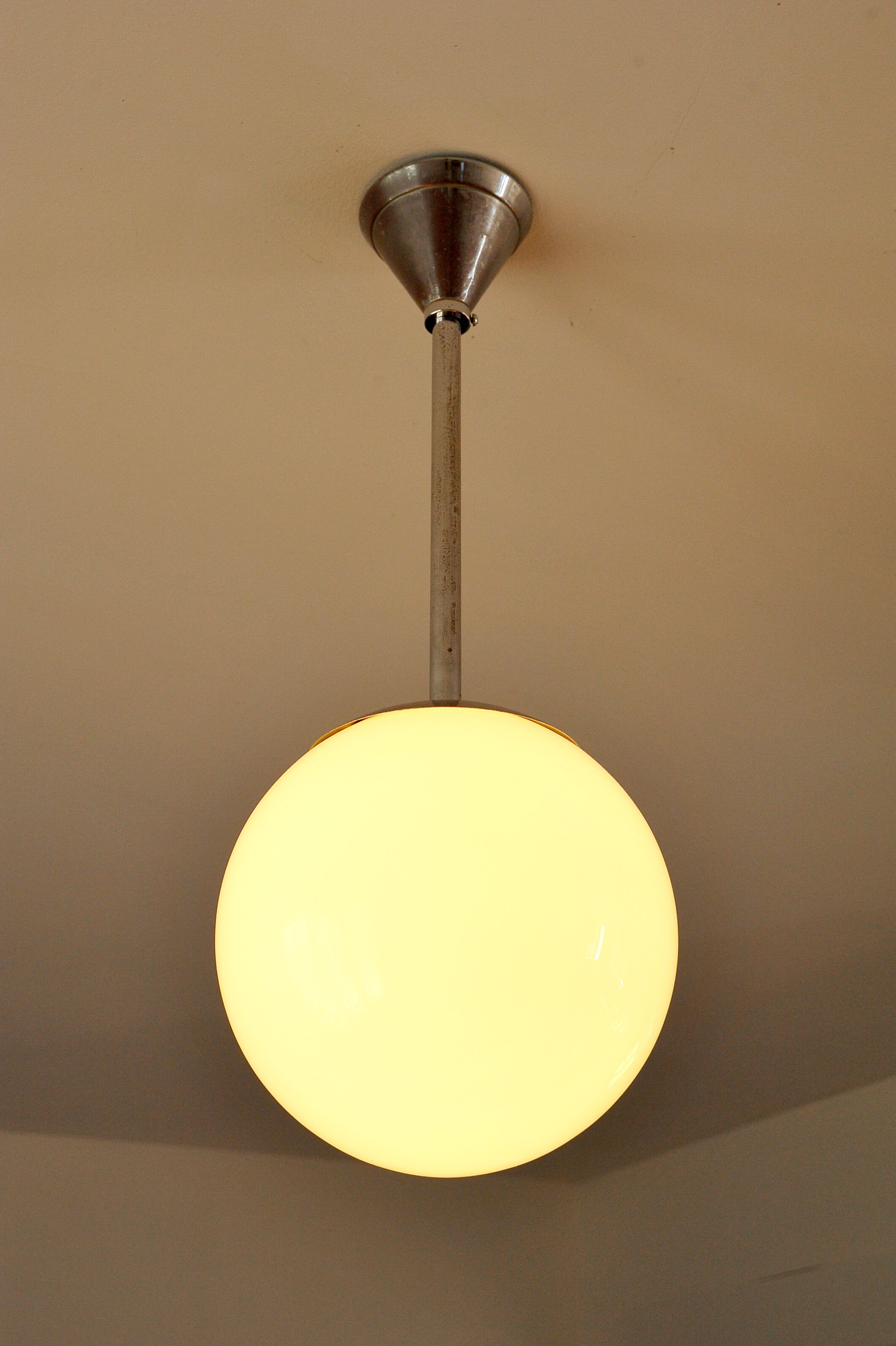Art Deco globe hanging lamp in opaline,1940