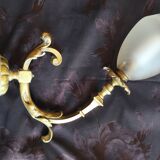 Bronze wall light with opaque glass tulip 1900