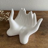 Empty white ceramic hand pocket