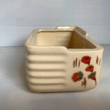 Art Deco planter with stencilled flower motif