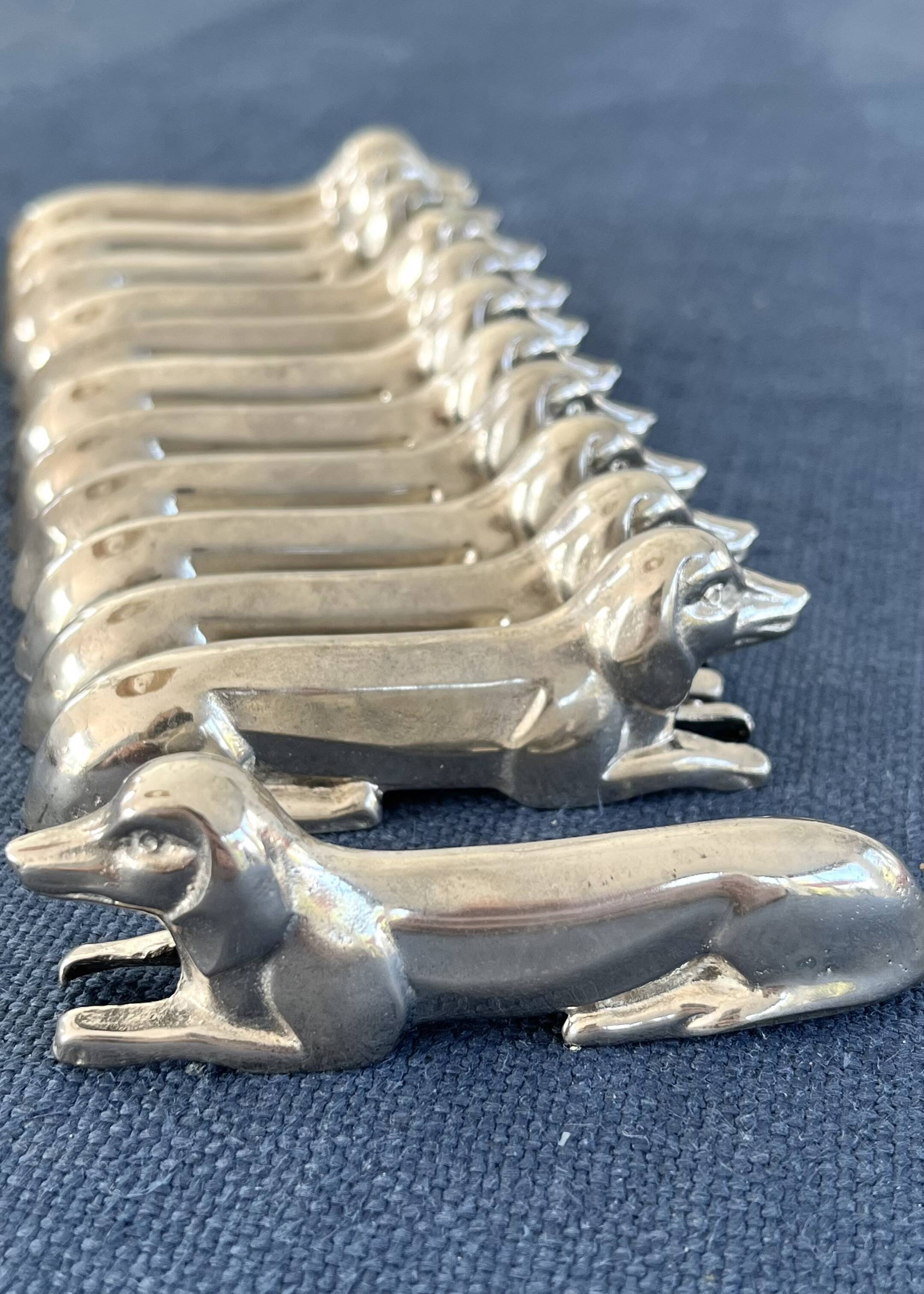 12 metal dachshund knife rests