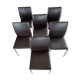 Brown leather chairs and Zanotta metal legs