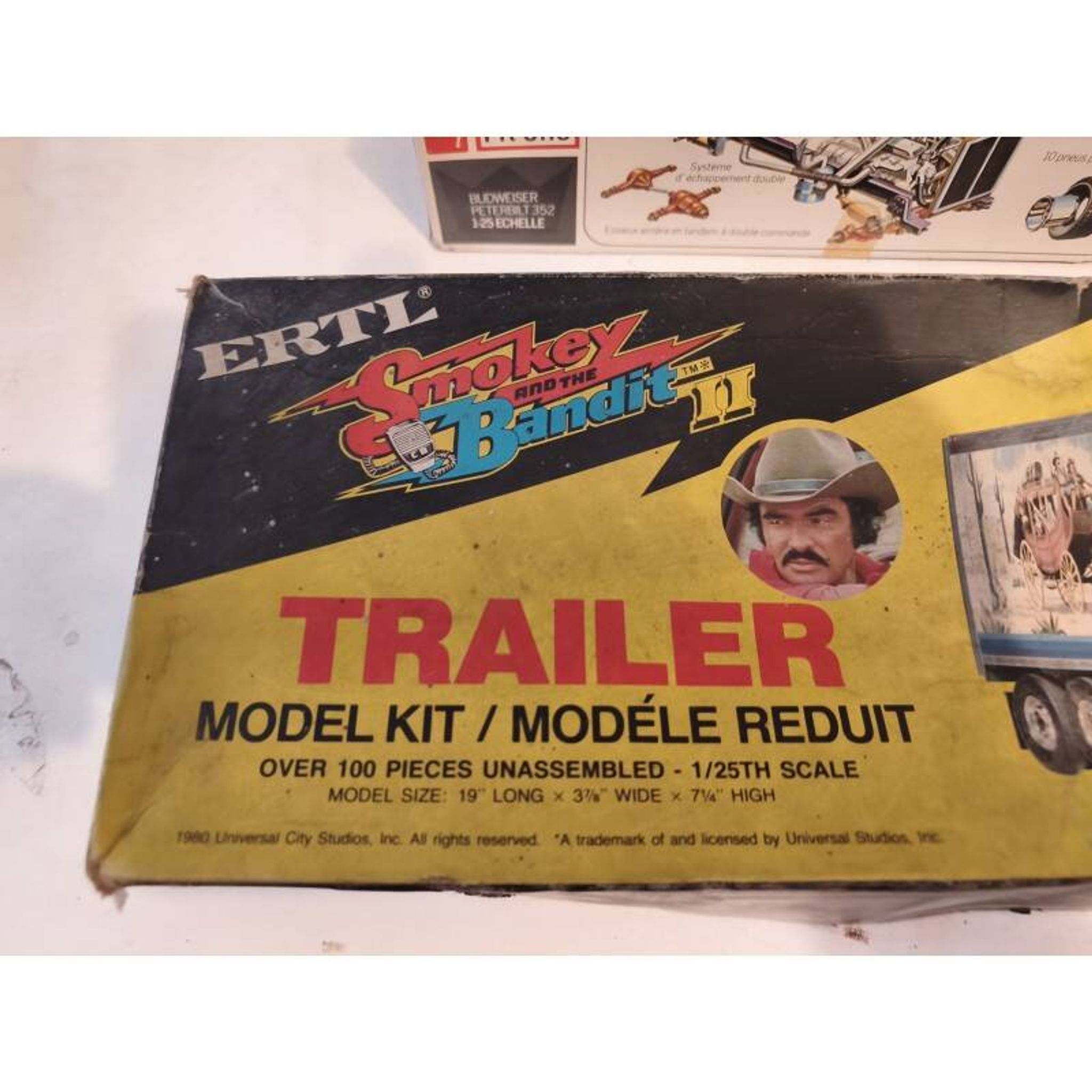 2 boxes of vintage toys