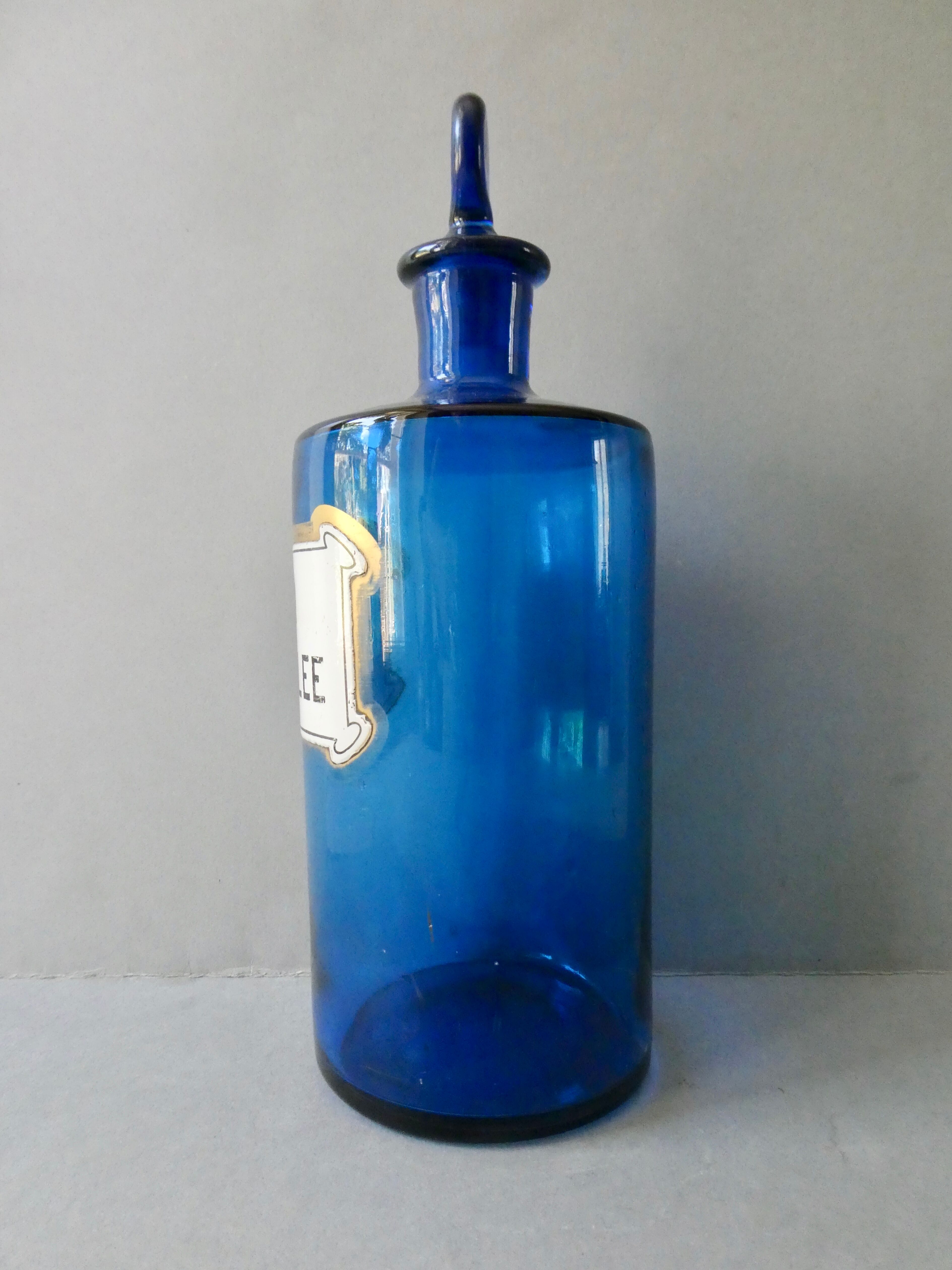 Bottle, pharmacy bottle in blue blown glass