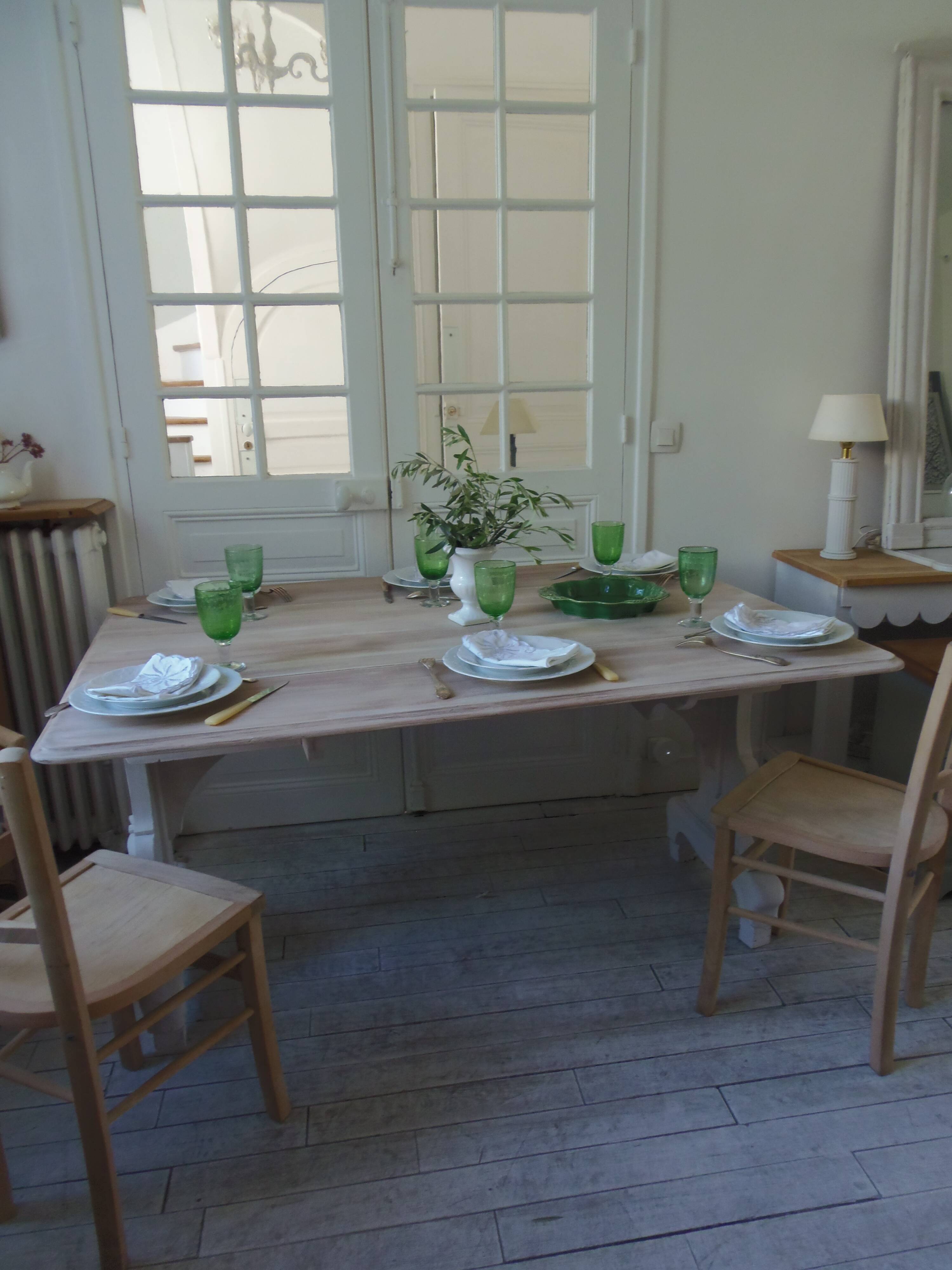 Console, solid walnut table, foldable extensions, grey patinated legs.