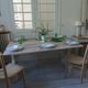 Console, solid walnut table, foldable extensions, grey patinated legs.